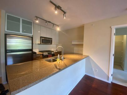 2-bedroom2-bathroom-concrete-high-rise-condo-by-brentwood-mall